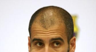 Guardiola to extend Barca contract to June 2012