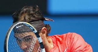 Aus Open: Nadal motors on as Daniel retires
