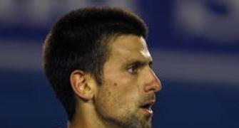 Djokovic destroys Berdych for crack at Federer