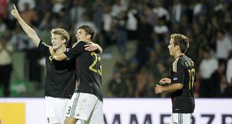 Germany on brink of Euro spot, Sweden triumph