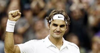 Photos: Federer tames Mannarino, Hewitt, Li ousted