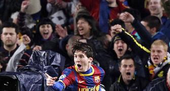 CL Images: Messi mauls Arsenal as Barca go through