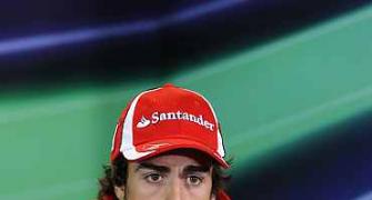 Alonso happy to take points after messy start