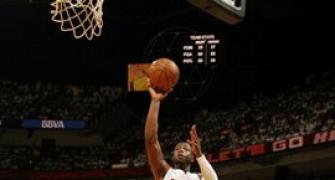 Wade shines as Heat burn Celtics in opener