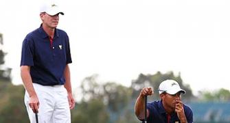 Presidents Cup: Woods, Stricker crash but US in command