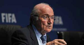 Blatter apologises but will not resign
