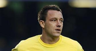 Police question Chelsea skipper Terry over racism claims