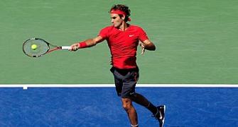PHOTOS: Federer, Serena cruise into third round