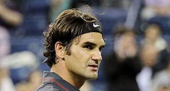 PHOTOS: Federer, Nadal advance