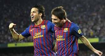 Merciless Messi hits three as Barca win 8-0
