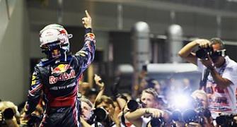 Vettel storms to Singapore win, on verge of re-writing history