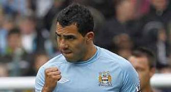 Tevez makes peace; expresses desire to stay at City