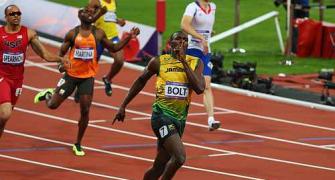 PHOTOS: Bolt does back-to-back sprint double