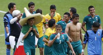 Football: Peralta double helps Mexico shock Brazil