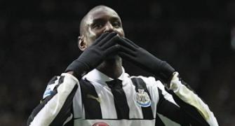 Ba double leads Newcastle to victory over 10-man Wigan
