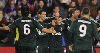 Ozil double earns Real Madrid comeback victory