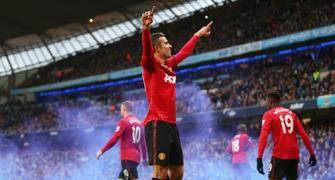 Photos: Van Persie scores on Manchester derby debut