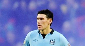 City's Barry charged with insulting match official