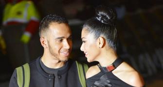 Photos: Lewis Hamilton and Nicole look loved up