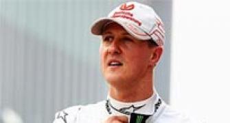 Schumacher plays down title chances
