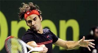 Federer and Nadal ease into Qatar quarter-finals
