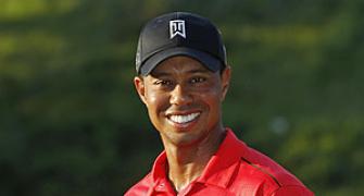 Woods moves up on winners list with AT&T victory