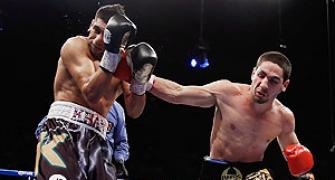 Briton Khan knocked out in fourth round by Garcia