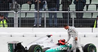 German GP: Button fastest, Schumi crashes in practice