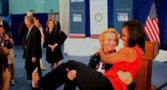 Michelle Obama lifted by US wrestler