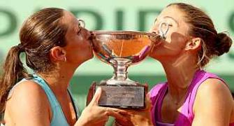 Errani keeps twin title dream alive with doubles victory