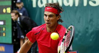 Nadal, Federer win opening matches at Halle Open