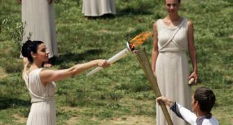 PHOTOS: London 2012 torch lit in Olympia