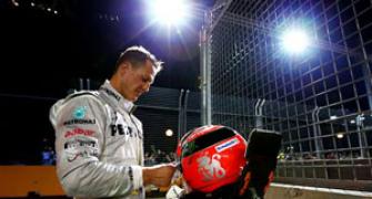 Schumacher reprimanded for impeding HRT drivers