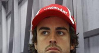 Alonso seeks to tighten grip in Singapore