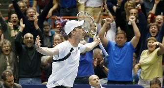 Davis Cup: Djokovic beats Isner, but Querrey puts US level