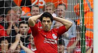 Liverpool's Suarez charged with violent conduct