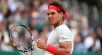Nadal ousts Paire in rain-delayed Barcelona match
