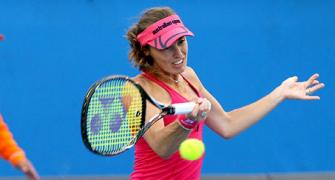 Hingis rules out playing singles despite doubles return