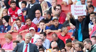 Don't extend Wenger's contract, angry Arsenal fans tell club