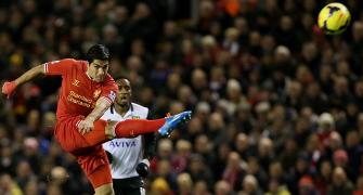 EPL PHOTOS: Suarez fires Liverpool as Arsenal, Chelsea, City win