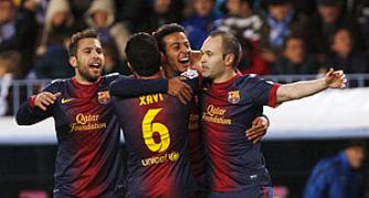 La Liga: Record for Barca as they march on at Malaga