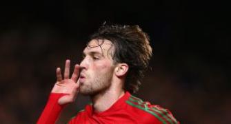 Michu signs four-year deal with Swansea