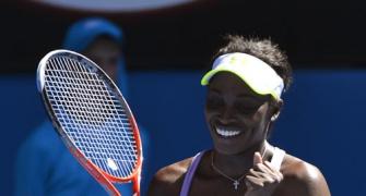 PHOTOS: Stephens stuns ailing Serena, Federer forges on