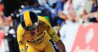 Tour de France: Froome accelerates as Martin wins time trial