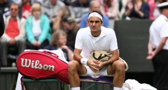 Down but not out, declares Federer
