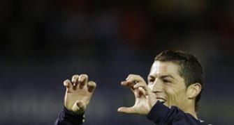 Ronaldo double lifts Real to second in La Liga