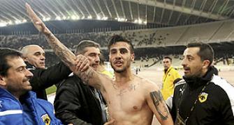 Greek soccer player banned over Nazi salute