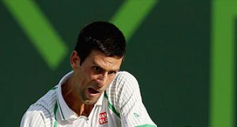 Djokovic breezes past Somdev at windy Miami
