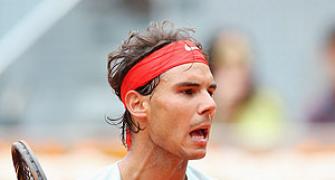 Nadal checks Paire to advance in Madrid