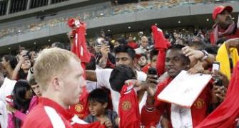 United's Scholes to retire at end of season